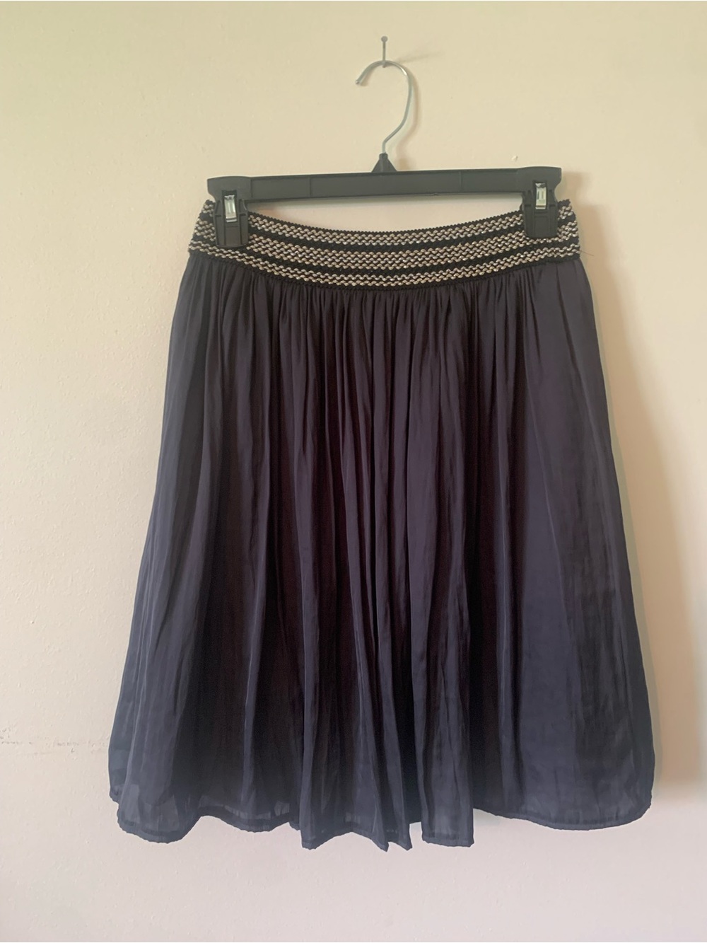Dark blue satiny mini skirt with metallic gold and silver stretchy waste-band